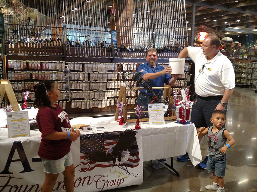 South Bay chairman Manny Machado and committee member Ben Santos Running booth on August 26-28 at the San Jose Bass Pro Shop store and Manager D